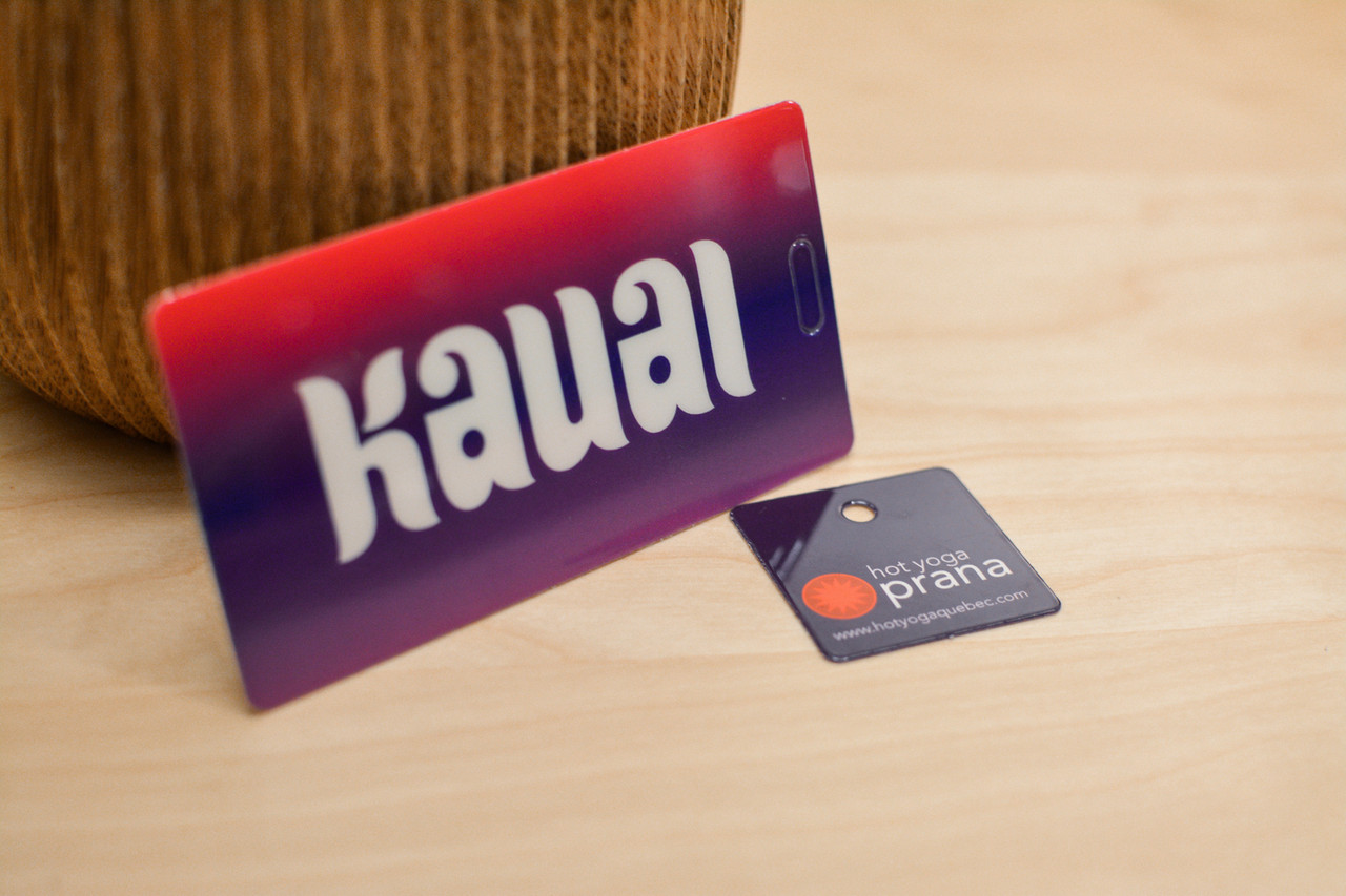 Two pink and purple card designs for a yoga studio card and key tag