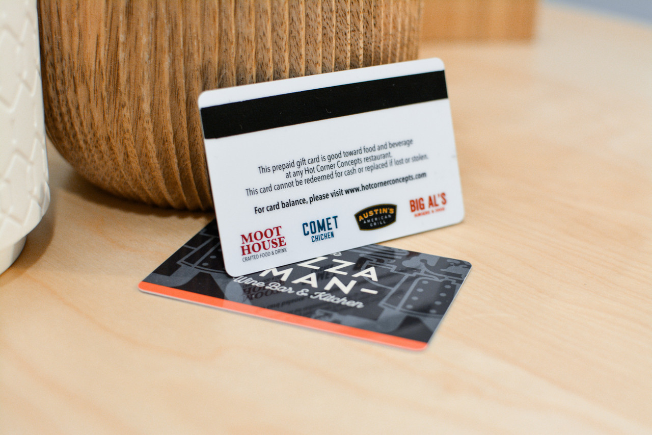 A slick, dark gift card design for a sushi company