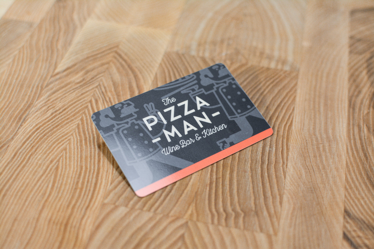Close up of a card design for a pizza company