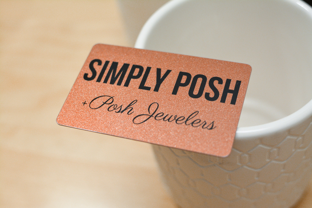 A very sparkly copper-colored card for a jewelry store