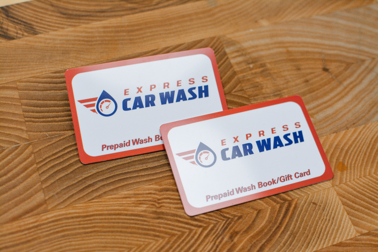 Two plastic cards for a car wash with retro designs